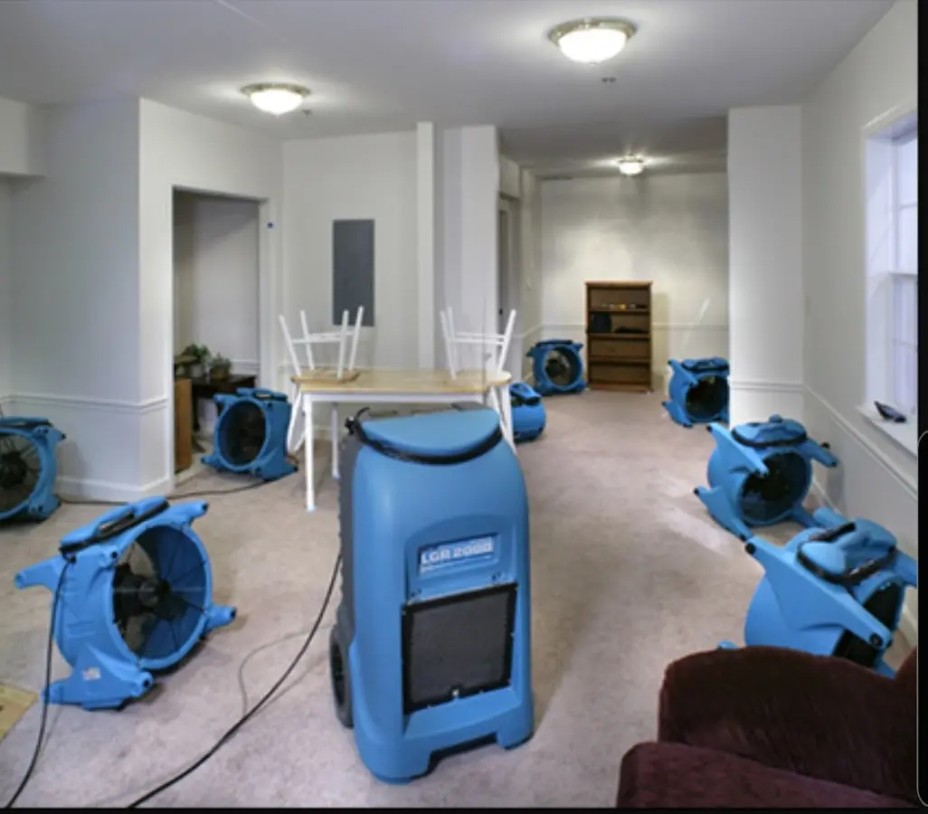 Air movers and dehumidifier setup for Water Damage Restoration in Middle River